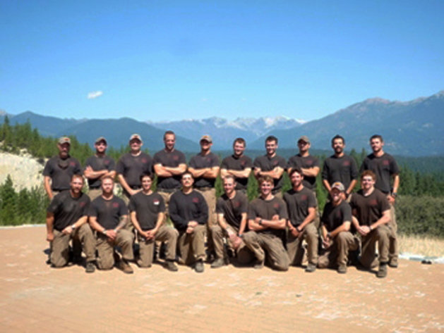 Unidentified members of the Granite Mountain Interagency Hotshot Crew from Prescott, Ariz., pose together in this undated photo provided by the City of Prescott. Some of the men in this photograph were among the 19 firefighters killed while battling an out-of-control wildfire near Yarnell, Ariz., on Sunday, June 30, 2013, according to Prescott Fire Chief Dan Fraijo. It was the nation's biggest loss of firefighters in a wildfire in 80 years. (AP Photo/City of Prescott)