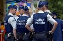 Belgian police officers patrol at the Midi Fair, one of the oldest summer events in Brussels, Belgium
