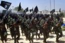 Islamist fighters loyal to Somalia's Shebab group perform military drills at a village outside Mogadishu