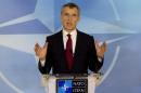 NATO Secretary General Jens Stoltenberg speaks during a media conference at NATO headquarters in Brussels on Thursday, Feb. 5, 2015. NATO defense ministers meet Thursday to discuss terrorism, the situation in Ukraine and the size and composition of the new spearhead force. (AP Photo/Virginia Mayo)