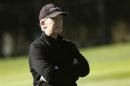 Bill Gross looks on while playing golf at Pebble Golf Links in Pebble Beach
