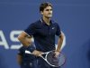 Federer of Switzerland challenges a call during his men's quarter-final match against Berdych of the Czech Republic at the US Open tennis tournament in New York
