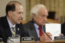 Camp and Levin question Werfel during a House Ways and Means Committee hearing on the status of the IRS's targeting of political groups, on Capitol Hill in Washington