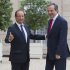 France’s President Francois Hollande, left, welcomes Greece's Prime Minister Antonis Samaras at the Elysee Palace, Paris, Saturday, Aug. 25, 2012. (AP Photo/Michel Euler)