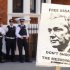 A pro-Julian Assange placard is seen outside the Embassy of Ecuador, in central London, Saturday August 18, 2012, where Wikileaks founder Julian Assange is claiming asylum in an effort to avoid extradition to Sweden.  Authorities in Sweden want to question Assange over allegations made by two women who accuse him of sexual misconduct during a visit to the country in mid-2010, but Assange asserts that the US will try to extradite him from Sweden to answer allegations relating to the WikiLeaks publication of US secrets. (AP Photo / Dominic Lipinski/PA) UNITED KINGDOM OUT - NO SALES - NO ARCHIVES