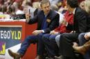 U.S. Sen. Rand Paul, R-Ky., left, talks to fans during the first half of an NCAA college basketball game between Iowa State and Texas Tech, Saturday, Feb. 7, 2015, in Ames, Iowa. (AP Photo/Charlie Neibergall)