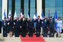 Central American leaders pose for the official picture of the XLVI Summit of Heads of State and Government of the SICA, at the Foreign Affairs Ministry in San Salvador on December 18, 2015
