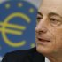 European Central Bank President Draghi listens the monthly ECB news conference in Frankfurt