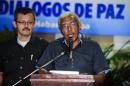 FARC-EP leftist guerrilla commander Joaquin Gomez reads a statement at the Convention Palace in Havana in the framework of peace talks with the Colombian government, March 4, 2015
