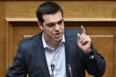 Greek Prime Minister Alexis Tsipras addresses a parliament session in Athens on March 30, 2015