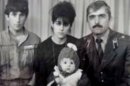 In this image taken from a video, an undated family photo provided by Patimat Suleimanova, the aunt of USA Boston bomb suspects, shows Anzor Tsarnaev left, Zubeidat Tsarnaev holding Tamerlan Tsarnaev and Anzor's brother Mukhammad Tsarnaev. Now known as the angry and grieving mother of the Boston Marathon bombing suspects, Zubeidat Tsarnaev is drawing increased attention after federal officials say Russian authorities intercepted her phone calls, including one in which she vaguely discussed jihad with her elder son. In another, she was recorded talking to someone in southern Russia who is under FBI investigation in an unrelated case, U.S. officials said. (AP Photo/Patimat Suleimanova)