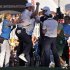 Team Europe golfer Kaymer celebrates winning his match against U.S. golfer Stricker to retain the Ryder Cup for Europe with Garcia, McIlroy and Hanson during the 39th Ryder Cup singles golf matches at the Medinah Country Club