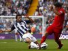 West Bromwich Albion's Yacob challenges Liverpool's Suarez during their English Premier League soccer match in West Bromwich