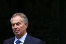 Former British Prime Minister Tony Blair leaves his office in London