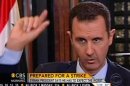 In this frame grab from video taken Sunday, Sept. 8, 2013, and provided by "CBS This Morning," Syrian President Bashar Assad responds to a question from journalist Charlie Rose during an interview in Damascus, Syria. In the interview broadcast Monday on CBS, Assad threatened to retaliate for any military strike launched in response to the alleged chemical weapons attack. "You should expect everything," Assad said. (AP Photo/CBS This Morning)