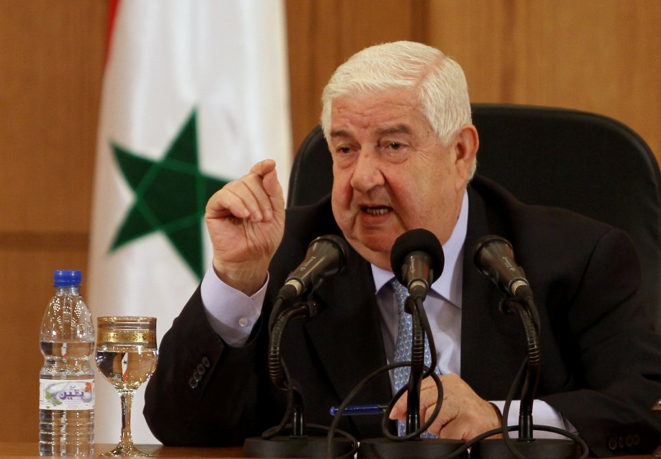 Syrian Foreign Minister Walid al-Moallem speaks during a press conference in Damascus, Syria on Tuesday, August 27, 2013. Syria's foreign minister said Tuesday his country would defend itself using "all means available" in case of a U.S. strike, denying his government was behind an alleged chemical weapons attack near Damascus and challenging Washington to present proof backing up its accusations.(AP Photo)