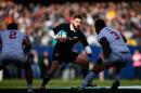 Cory Jane (C) of the All Blacks is tackled during an International Test Match against the United States on November 1, 2014 in Chicago, Illinois