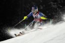 Mikaela Shiffrin, of the United States speeds past a pole on her way to clock the second fastest time in the first run of an alpine ski, women's World Cup slalom, in Flachau, Austria, Tuesday, Jan. 15, 2013. (AP Photo/Giovanni Auletta)