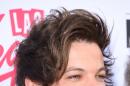Singer Louis Tomlinson of One Direction attends the 2015 Billboard Music Awards at MGM Grand Garden Arena on May 17, 2015 in Las Vegas, Nevada