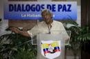 FARC negotiator Joaquin Gomez speaks to the media in Havana