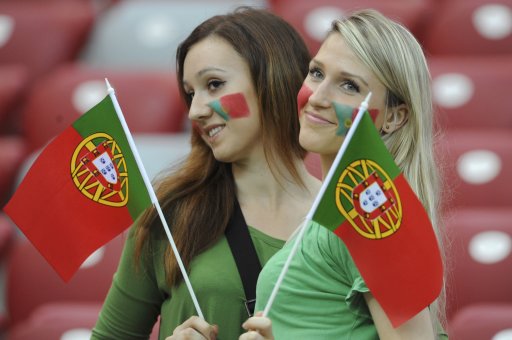 Portugal soccer fans pose before Euro 2012 quarter-final against Czech Republic in Warsaw