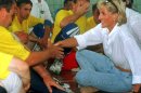 File-This Aug. 9, 1997 file photo shows Britain's Diana, Princess of Wales, meets with members of a Zenica volleyball team who have suffered injuries from mines. British police say they are examining newly received information relating to the deaths of Princess Diana and Dodi Fayed, and that officers are assessing the information's "relevance and credibility."Scotland Yard declined to provide details about the information, only saying Saturday Aug. 17, 2013, in a statement that the assessment will be carried out by officers from its specialist crime and operations unit. (AP Photo/Ian Waldie, File)