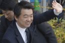 In this Dec. 4, 2012 photo, Japan Restoration Party acting leader Toru Hashimoto waves at his party supporters during his parliamentary elections campaign in Osaka, western Japan. The buzz over Japan's parliamentary elections this Sunday, Dec. 16, has been all about 