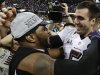 Baltimore Ravens linebacker Ray Lewis, left, and quarterback Joe Flacco celebrate their 34-31 win against the San Francisco 49ers in the NFL Super Bowl XLVII football game, Sunday, Feb. 3, 2013, in New Orleans. (AP Photo/Julio Cortez)