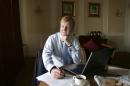 FILE - In this Sept. 21, 2005 file photo, British Liberal Democrat leader Charles Kennedy prepares his conference speech at a hotel in Blackpool, England. Charles Kennedy was a rare thing - a genuinely popular politician, and led his Liberal Democrat party to record success before his career in British politics was cut short by alcoholism. His death at 55 brought tributes Tuesday, June 2, 2015 from across politics and beyond for a man whose wit and warmth made him stand out from the pack. (Martin Rickett/PA Wire via AP, File) UNITED KINGDOM OUT, NO SALES, NO ARCHIVE