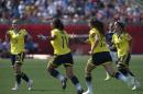 Colombia celebrates their second goal against France during the second half of a FIFA Women's World Cup soccer game in Moncton, New Brunswick, Canada, on Saturday, June 13, 2015. (Andrew Vaughan/The Canadian Press via AP) MANDATORY CREDIT