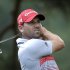 Sergio Garcia, of Spain, tees off on the eighth hole during the first round of the U.S. Open golf tournament at Merion Golf Club, Thursday, June 13, 2013, in Ardmore, Pa. (AP Photo/Julio Cortez)