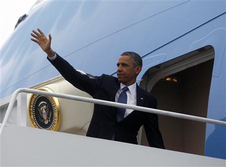 President Barack Obama steps aboard Air Force one at Andrews Air Force Base near Washington, May 19, 2013. REUTERS/Jason Reed