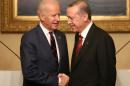 U.S. Vice President Joe Biden, left, and Turkish President Recep Tayyip Erdogan shake hands after a joint news conference in Istanbul, Turkey, Saturday, Nov. 22, 2014. Biden on Friday became the latest in a parade of U.S. officials trying to push Turkey to step up its role in the international coalition's fight against Islamic State extremists. (AP Photo/Emrah Gurel)