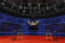 Two chairs that will be used by U.S. President Barack Obama and Republican presidential nominee Mitt Romney sit empty during preparations for Tuesday's presidential debate, at Hofstra University in New York
