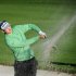 England's Justin Rose blasts his way out of the bunker on the 11th hole during first round play in the Arnold Palmer Invitational PGA golf tournament in Orlando