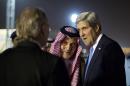 U.S. Secretary of State John Kerry is escorted by Saudi Foreign Minister Prince Saud Al-Faisal bin Abdulaziz al-Saud, as Kerry arrives in Riyadh, Saudi Arabia, Sunday, Nov. 3, 2013. (AP Photo / Jason Reed, Pool)