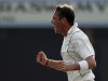 New Zealand's Southee celebrates taking the wicket of Sri Lanka's Dilshan during the fourth day of second and final test cricket match in Colombo