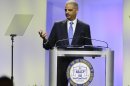 Attorney General Eric Holder delivers the keynote address at the annual NAACP convention, Tuesday, July 16, 2013, in Orlando, Fla. (AP Photo/John Raoux)