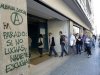 People enter an unemployment registry office in Mataro near Barcelona
