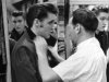 FILE - This 1956 file photo originally released courtesy of Bernard Lansky shows singer Elvis Presley, left, being outfitted by clothier Bernard Lansky at Lansky's Men's Store in Memphis, Tenn. Lansky, who helped a young Elvis Presley establish his signature clothing style, died Thursday, Nov. 15, 2012 at his Memphis home, according to his granddaughter Julie Lansky. He started his retail business in Memphis in 1946 with a $125 loan from his father, Samuel.  He was 85. (AP Photo/courtesy of Bernard Lansky, File)