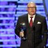 Bruce Arians, formerly with the Indianapolis Colts and now with the Arizona Cardinals, accepts the AP Coach of the Year award at the 2nd Annual NFL Honors on Saturday, Feb. 2, 2013 in New Orleans. (Photo by AJ Mast/Invision/AP)
