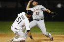 White Sox right fielder Rios breaks up a double play as Tigers shortstop Peralta tried to make the play in the ninth inning of their MLB baseball game in Chicago