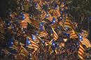 Catalans hold independence flags during celebrations of Catalonia National Day in Barcelona on September 11, 2014