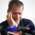 Former 50 km race walk 2008 Olympic gold medallist Alex Schwazer of Italy reacts as he holds a news conference in Bolzano