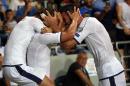 Italy's forward Graziano Pelle (R) and teammates celebrate scoring against Israel on September 5, 2016