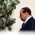 Italian Prime Minister Silvio Berlusconi leaves his residence downtown in Rome