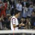 Nishikori of Japan reacts after win over Raonic of Canada in men's singles finals match at Japan Open tennis championships in Tokyo