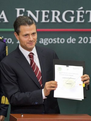 Mexico's President Enrique Pena Nieto shows to the …