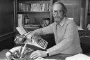 FILE - In this March 31, 1983 file photo, writer Elmore Leonard sits by his typewriter at his home in Birmingham, Mich. Leonard, a former adman who later in life became one of America's foremost crime writers, has died. He was 87. His researcher says he passed away Tuesday morning, Aug. 20, 2013 from complications from a stroke. (AP Photo/Rob Kozloff)