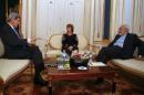 U.S. Secretary of State Kerry, Iranian FM Zarif and EU envoy Ashton pose for photographers in Vienna